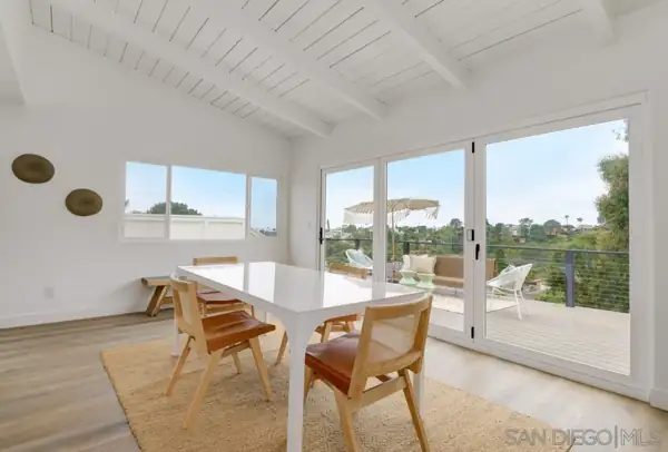 Dining area opening to the deck