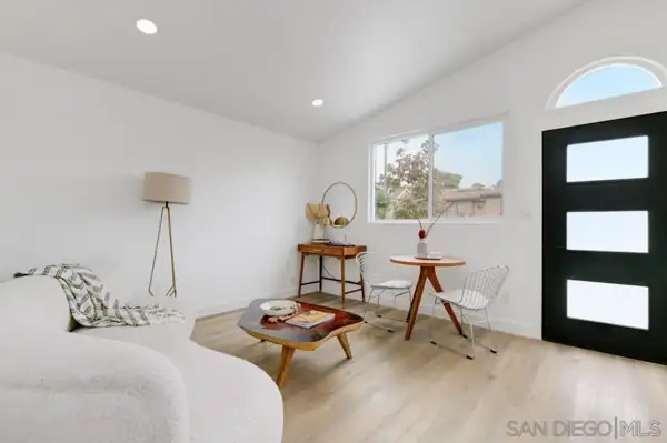 ADU living space with black front door