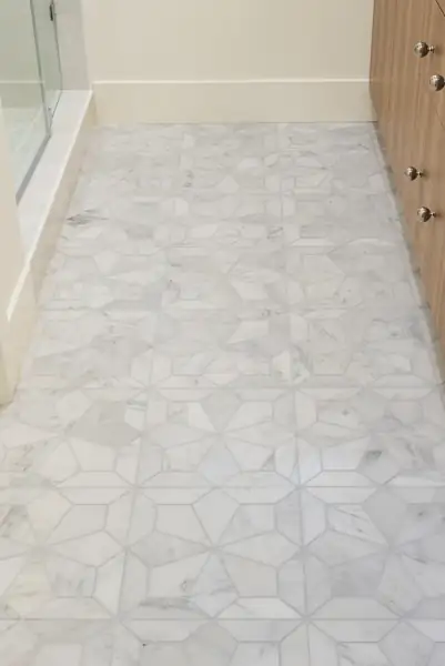 Geometric marble bathroom floor tile