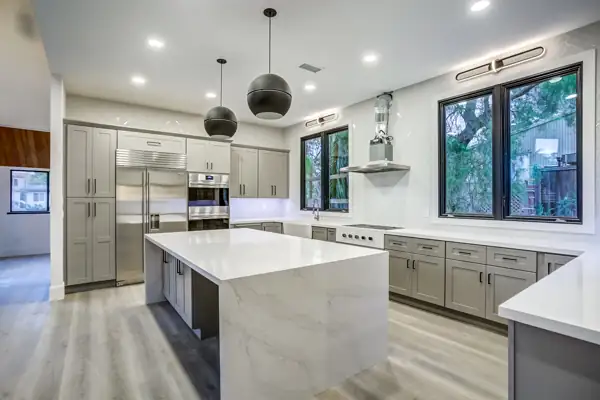 Mission Hills 1 remodel: kitchen with waterfall quartz island
