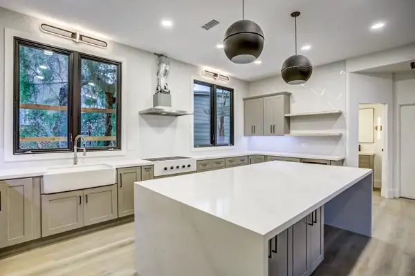Kitchen sink wall with farmhouse sink and herringbone tile