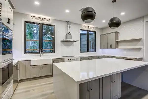 Kitchen island and cooktop wall
