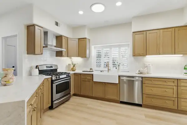 Kitchen range and farmhouse sink wall