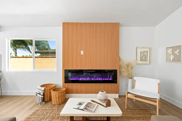 Oceanside 1: Slatted wood fireplace wall with linear fireplace