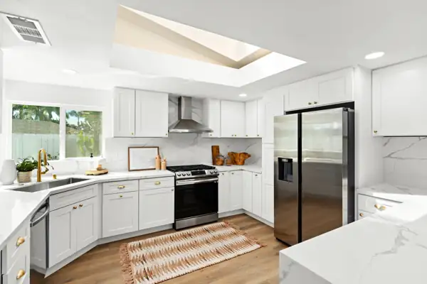 Kitchen range wall under a skylight